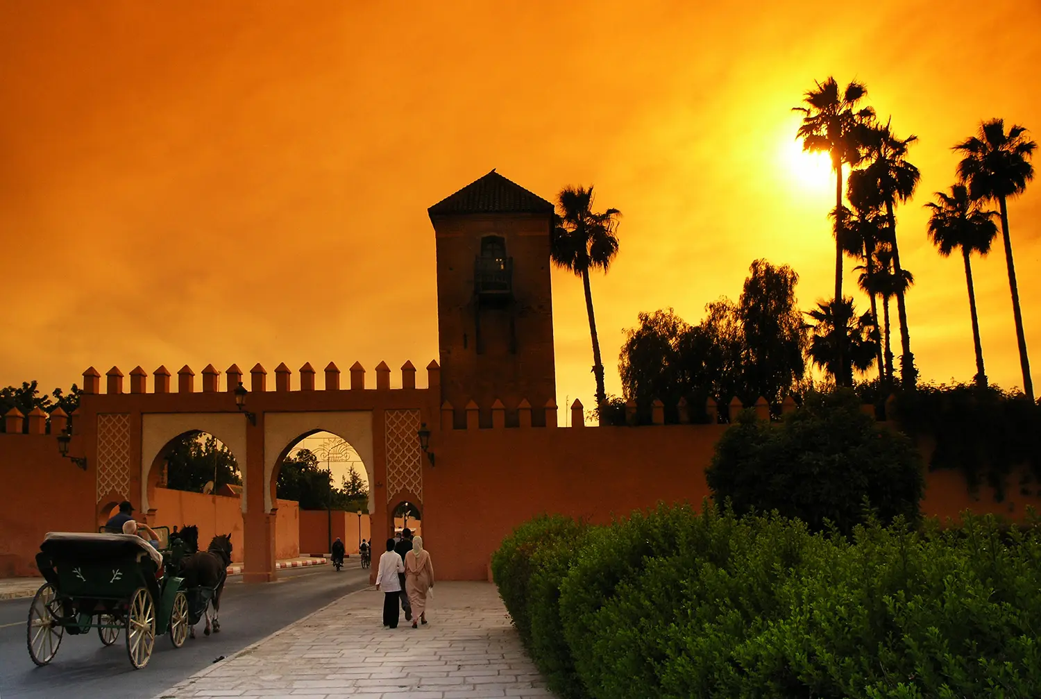 Marrakech old medina at sunset with orange sky and calm atmosphere