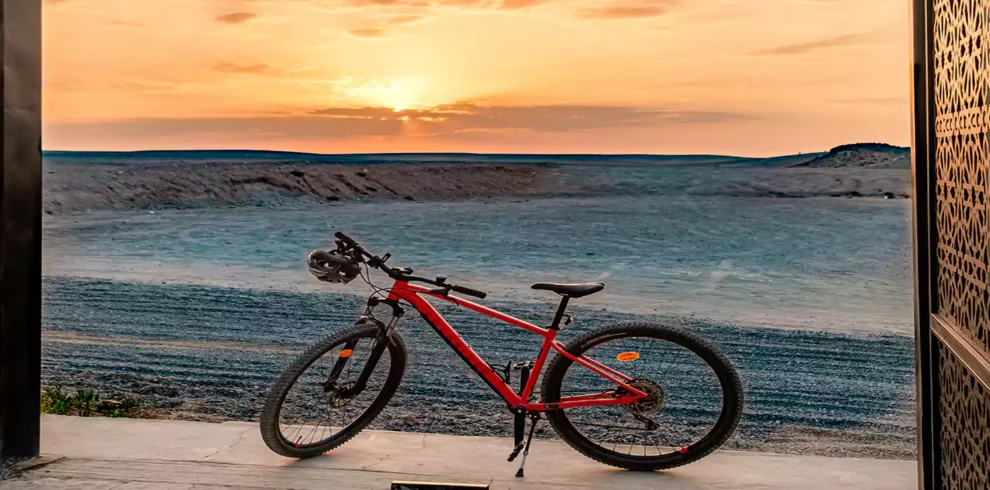 cycle adventure in the Agafay Desert, a calm adventure with scenic routes, open landscapes, and unforgettable sunset views